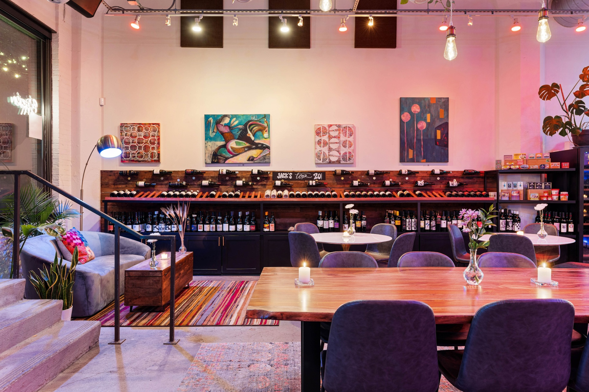 Jack's Top 20 wall of curated bottles above lounge seating.