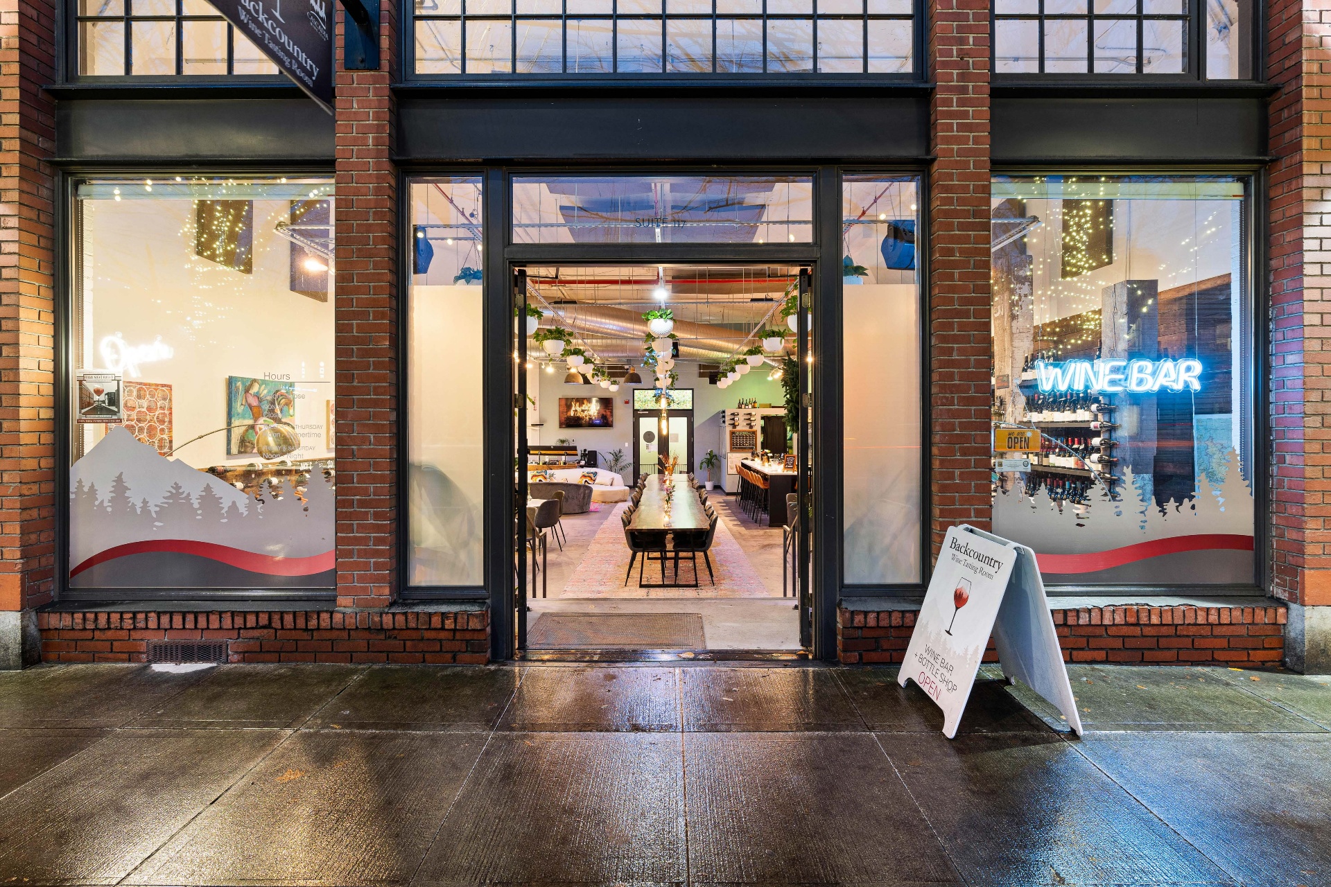 Backcountry storefront at dusk inside the historic Ford Building.
